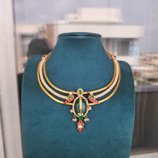 Haritah-handmade pearl hasli with green stone and jadau motifs