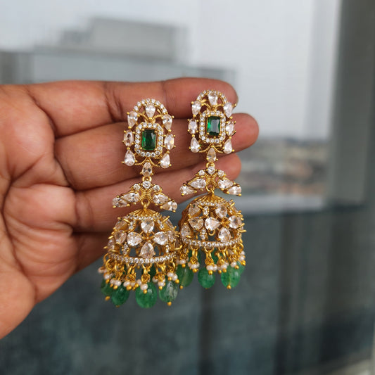 Cz and green stone jumkha in gold plating