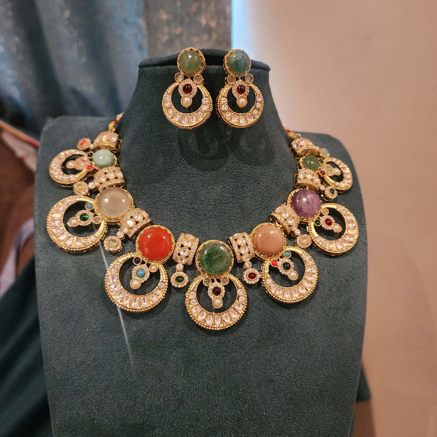 Sabhyasachi inspired moon motifs with multi color stones