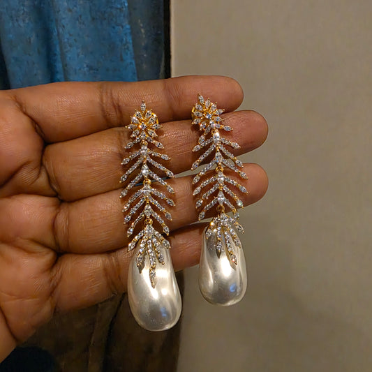 Amrta diamomd look alike earrings in gold plated