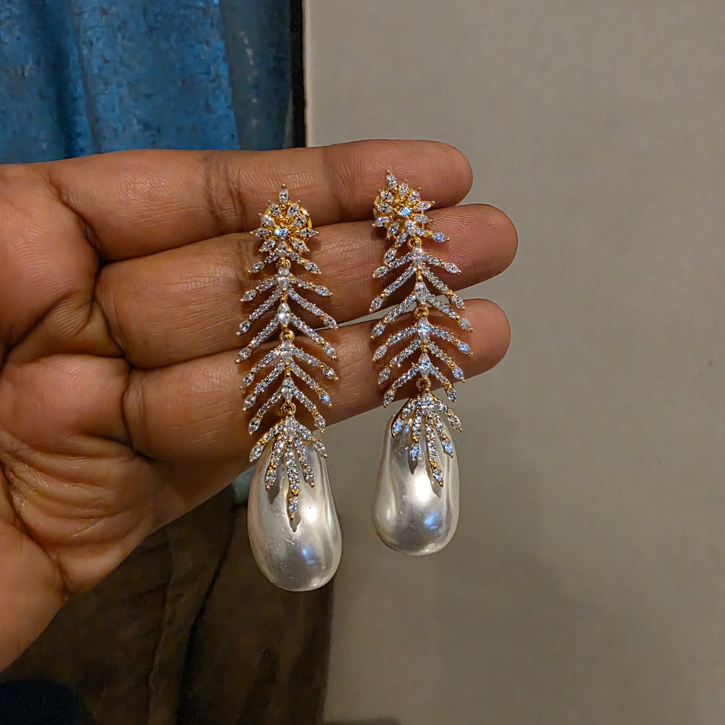Amrta diamomd look alike earrings in gold plated