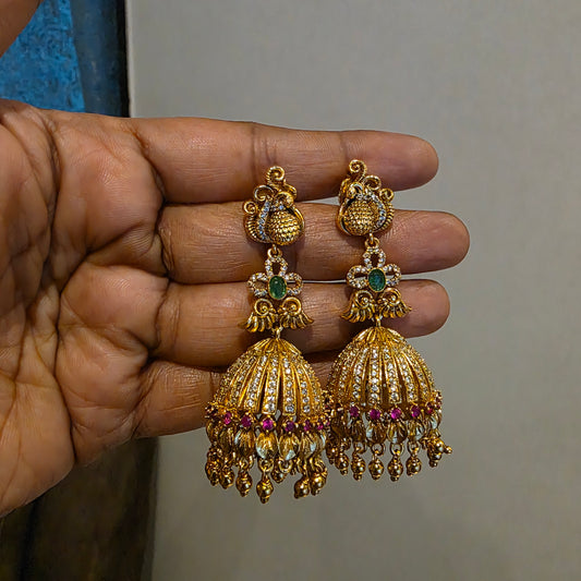 Shwetha- gold lookalike jumkha
