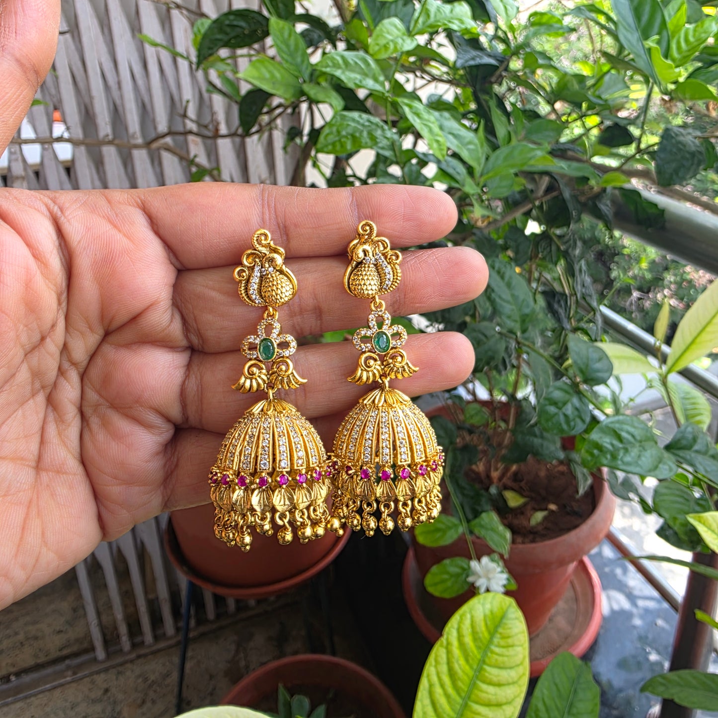 Shwetha- gold lookalike jumkha