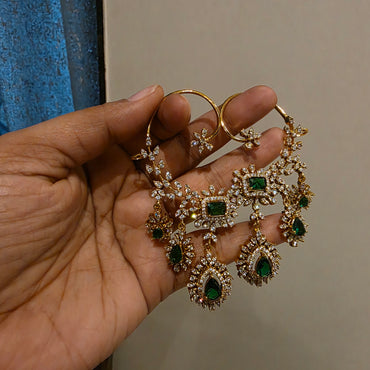 Rachana- ad and emarald green stone earcuffs