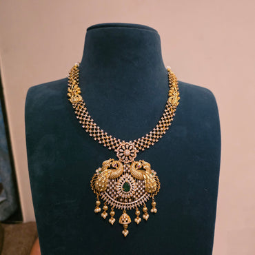 Navika- ad neckset with peacock motifs