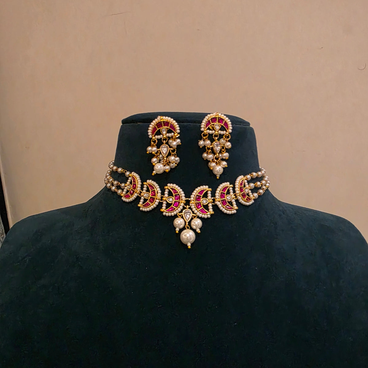 Naina pink - pearl choker set with jadau moon motifs