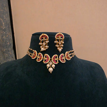 Naina pink - pearl choker set with jadau moon motifs