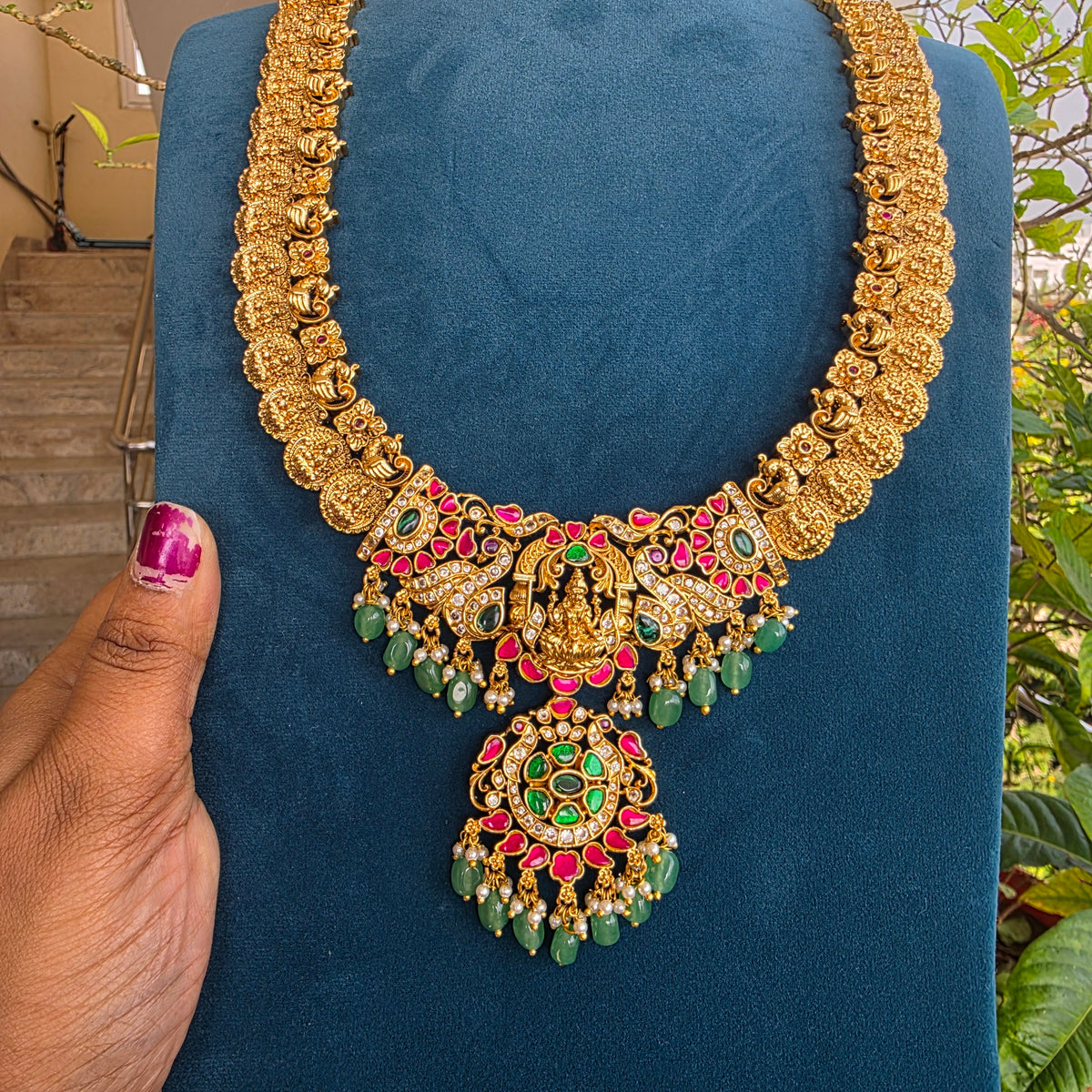 Sonali- lakshmi and peacock kasu mala with jadau detailing