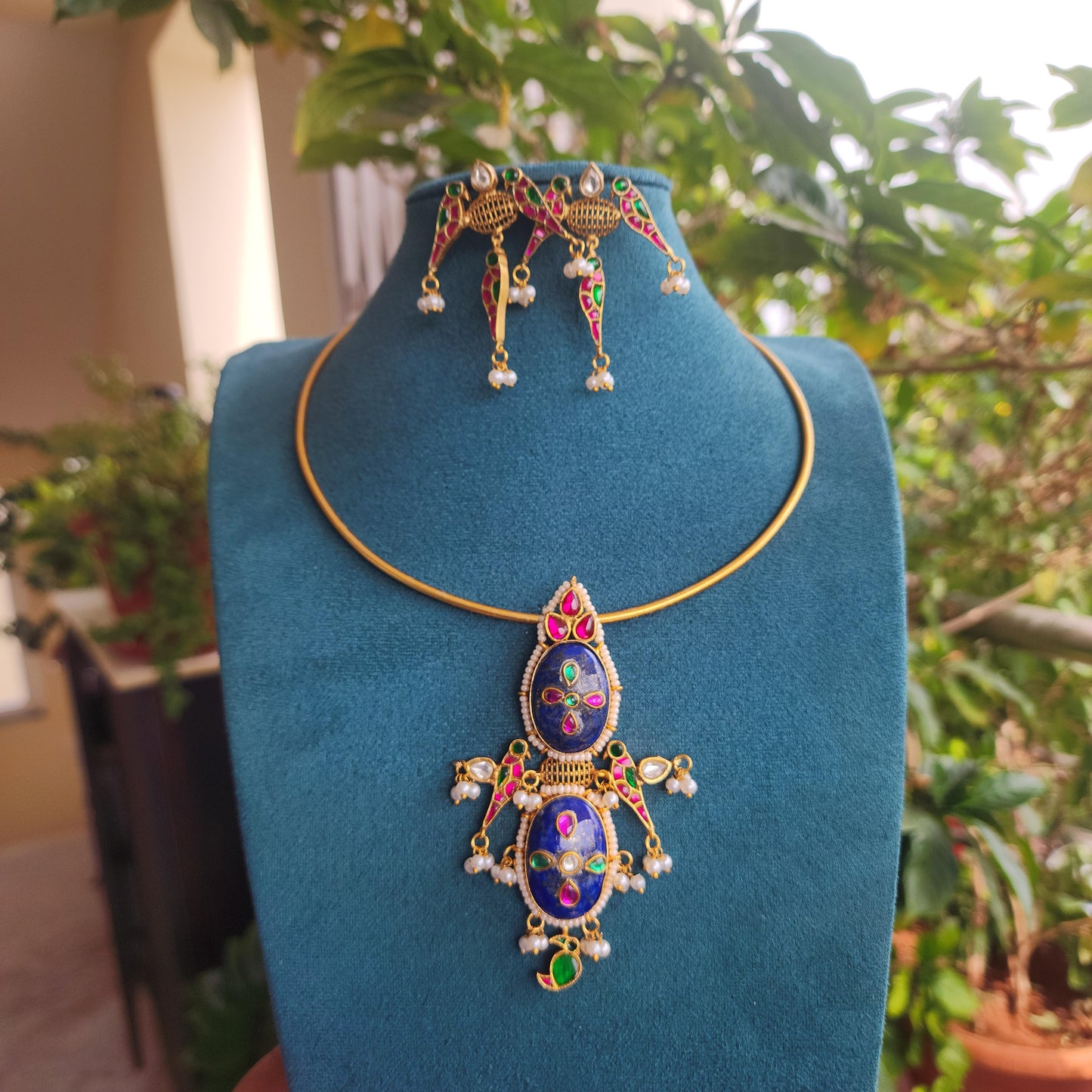 Sukah- handmade hasli with jadau kundan motifs and lapis stones
