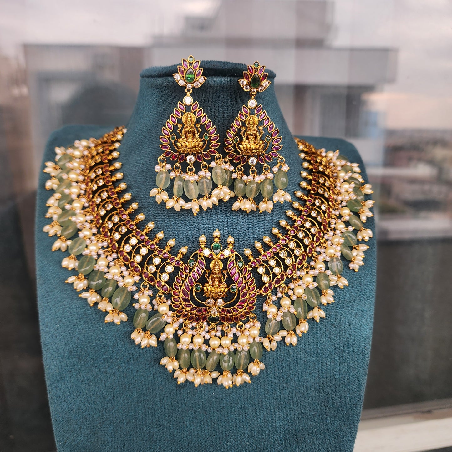 Lakshmi devi motif kempstone studded guttapusalu set