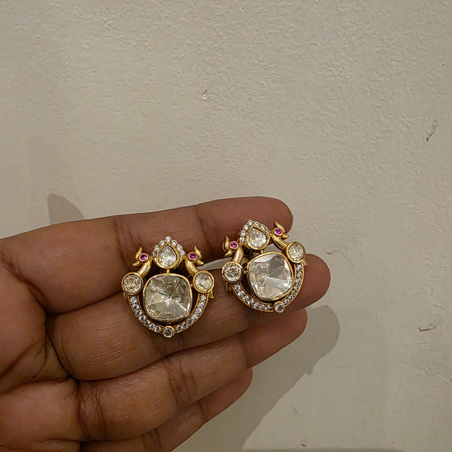 Dual peacock polki studs