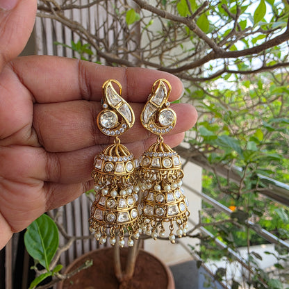 Moissanite polki double layered jumkha with peacock motif.