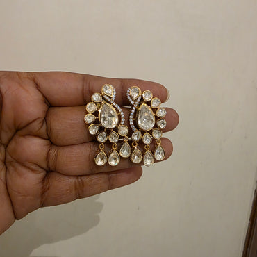 Peacock motif polki studs with polki drops