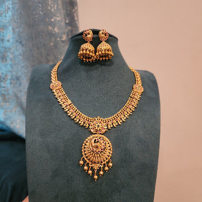 Solid gold replica neckset design with peacock motifs