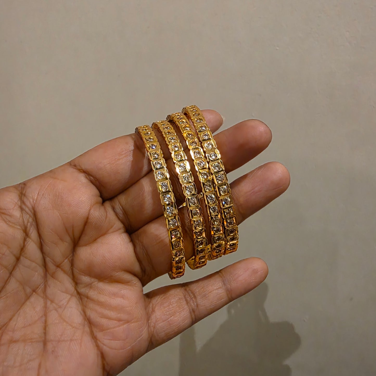 Tejaswi- impon gold like bangle set
