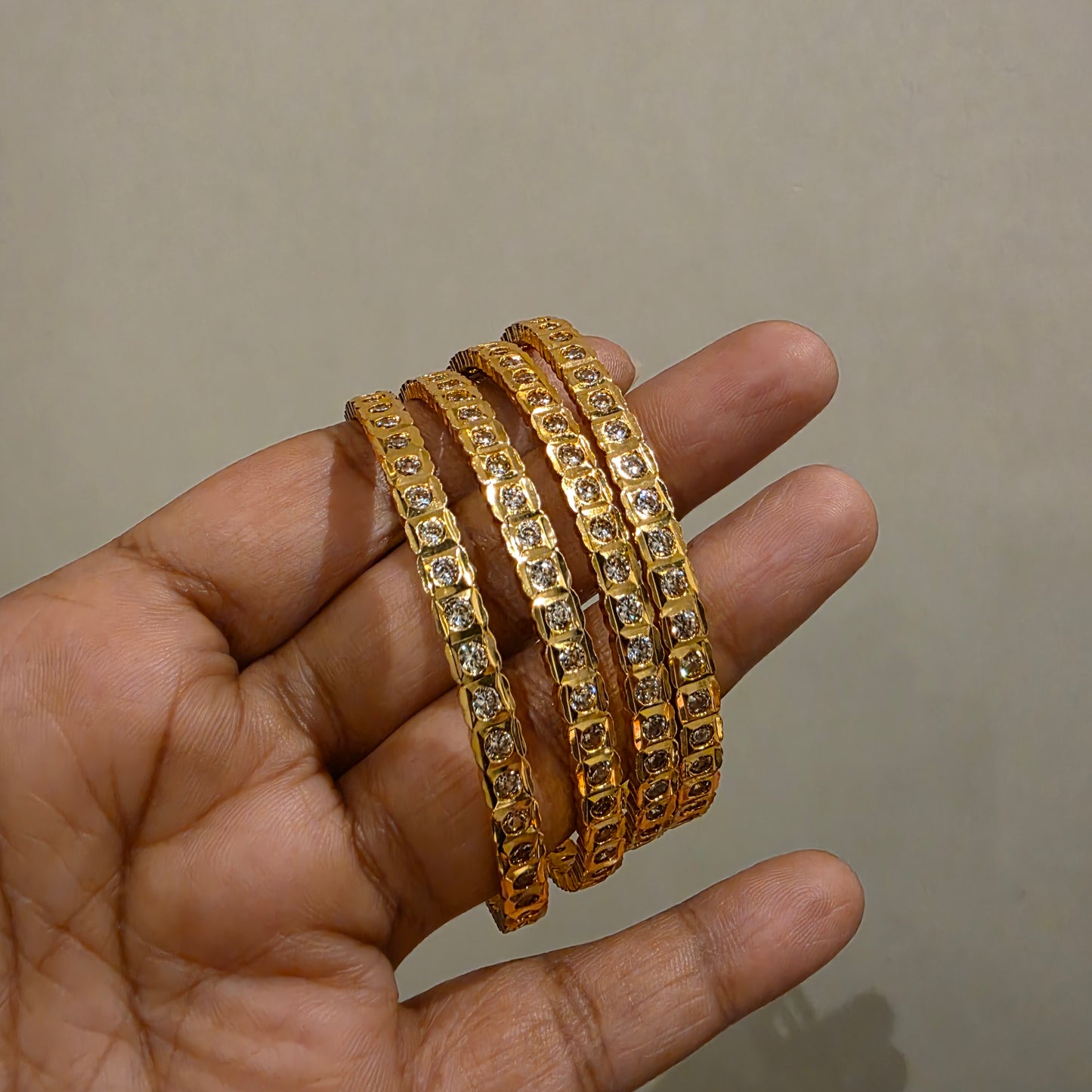 Tejaswi- impon gold like bangle set