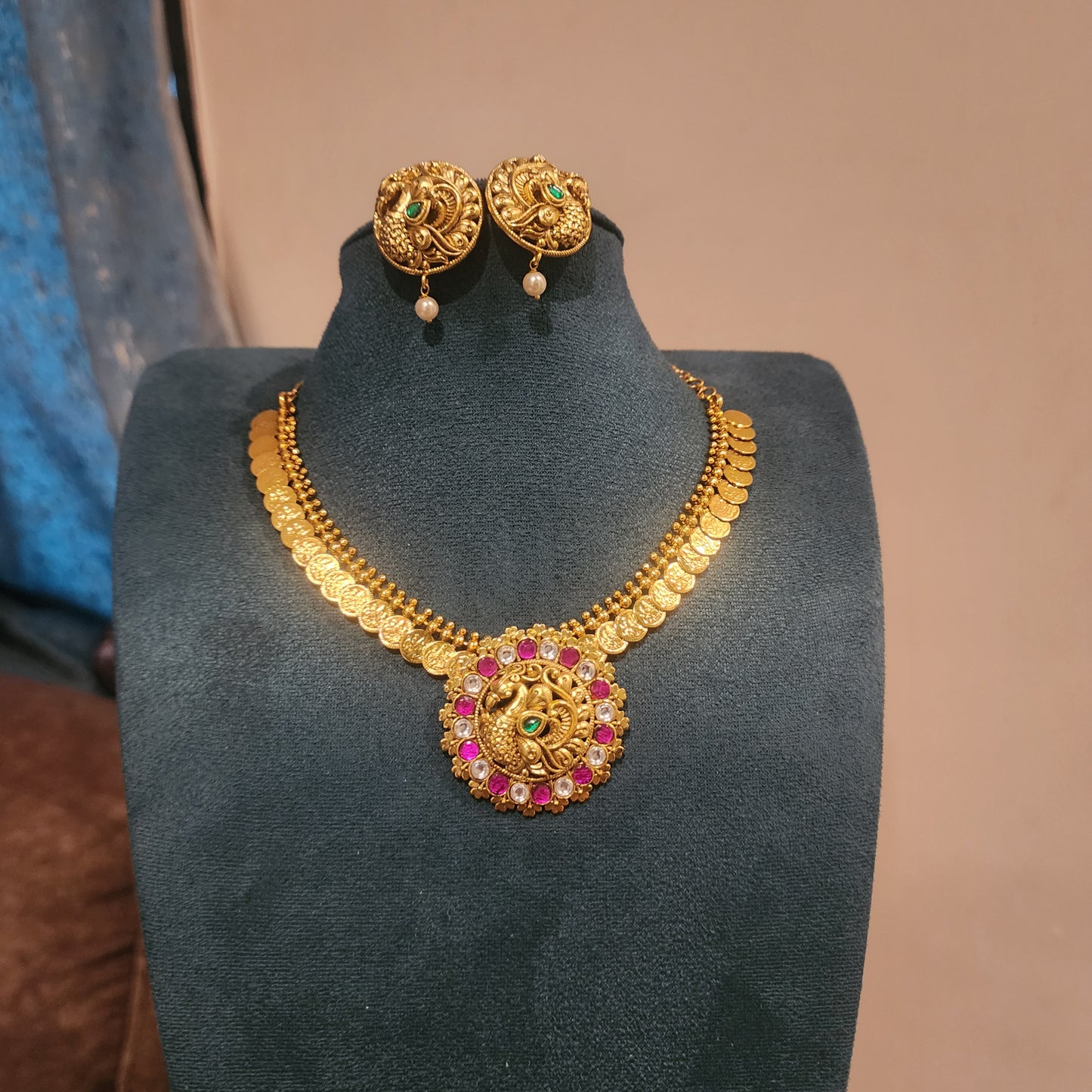 Mayurasri- tiny lakshmi kasu neckline with peacock jadu pendant set