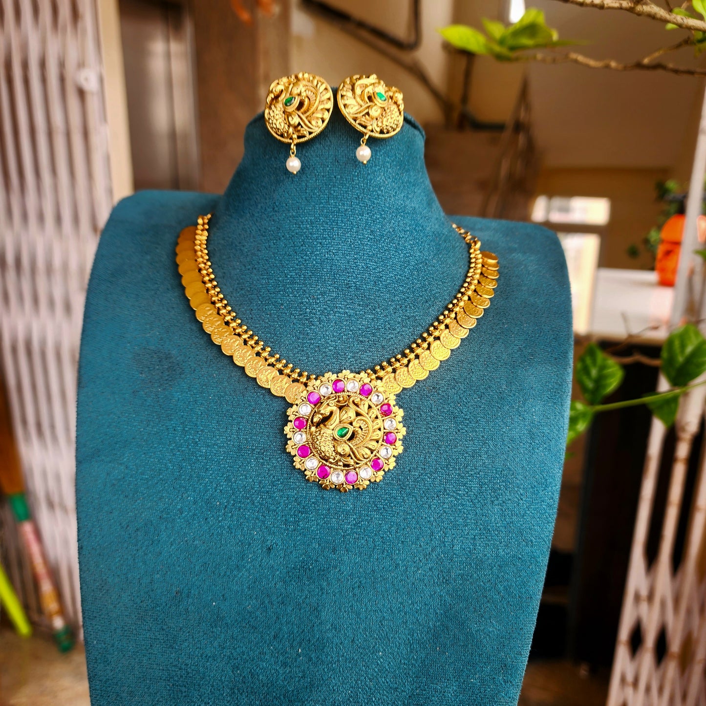 Mayurasri- tiny lakshmi kasu neckline with peacock jadu pendant set