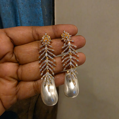 Amrta diamomd look alike earrings in gold plated