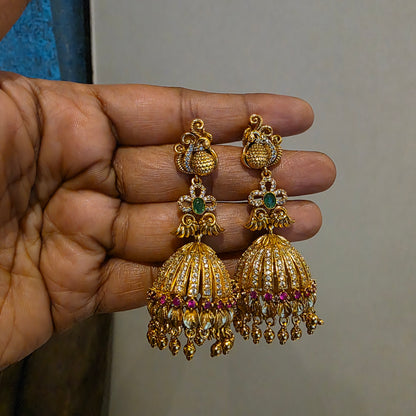 Shwetha- gold lookalike jumkha