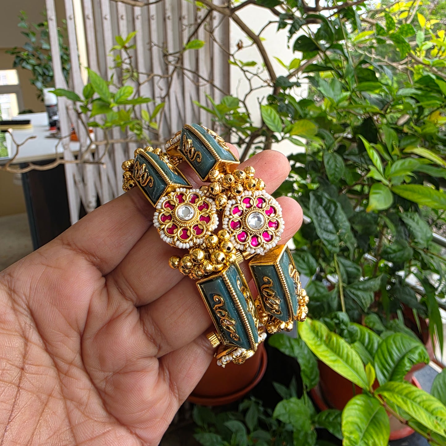 Rajasam- heritage openable kada with jadau motifs and inlay work