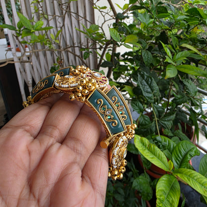 Rajasam- heritage openable kada with jadau motifs and inlay work