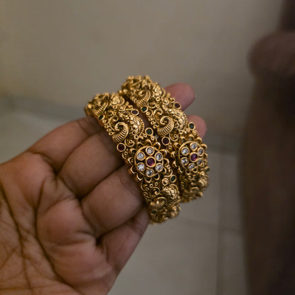 Reeva- antique peacock carving bangle kada pair[openable]