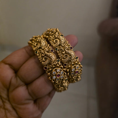 Reeva- antique peacock carving bangle kada pair[openable]