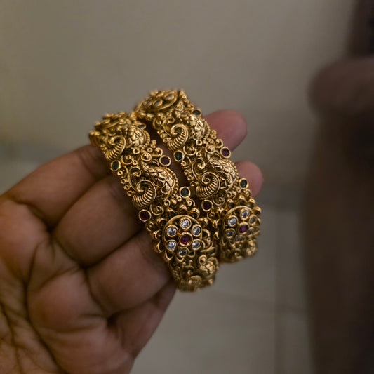 Reeva- antique peacock carving bangle kada pair[openable]