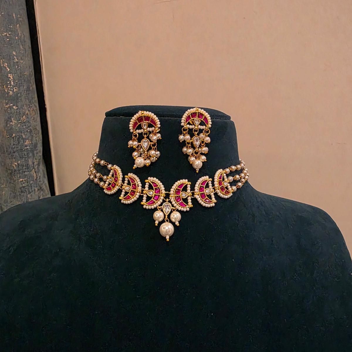 Naina pink - pearl choker set with jadau moon motifs