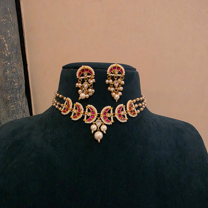 Naina pink - pearl choker set with jadau moon motifs