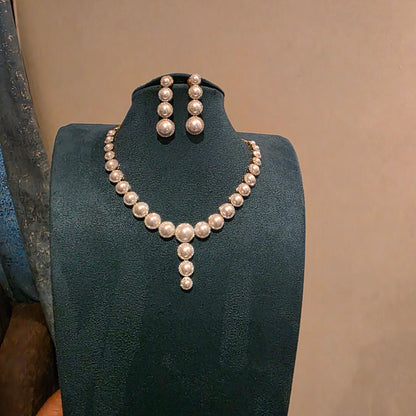 Mutyam- pearl and neckset