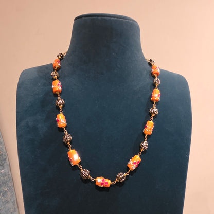 Kanakambaram- hasli with coral mala