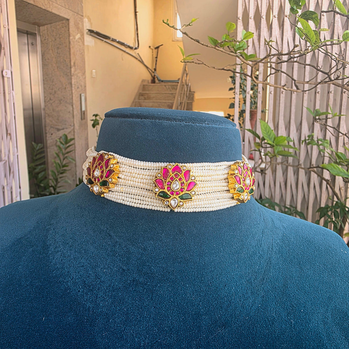 Kamalika- pearl  and lotus jadau motifs choker