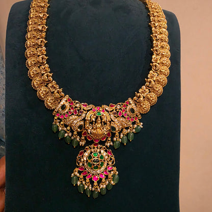 Sonali-  lakshmi and peacock kasu mala with jadau detailing