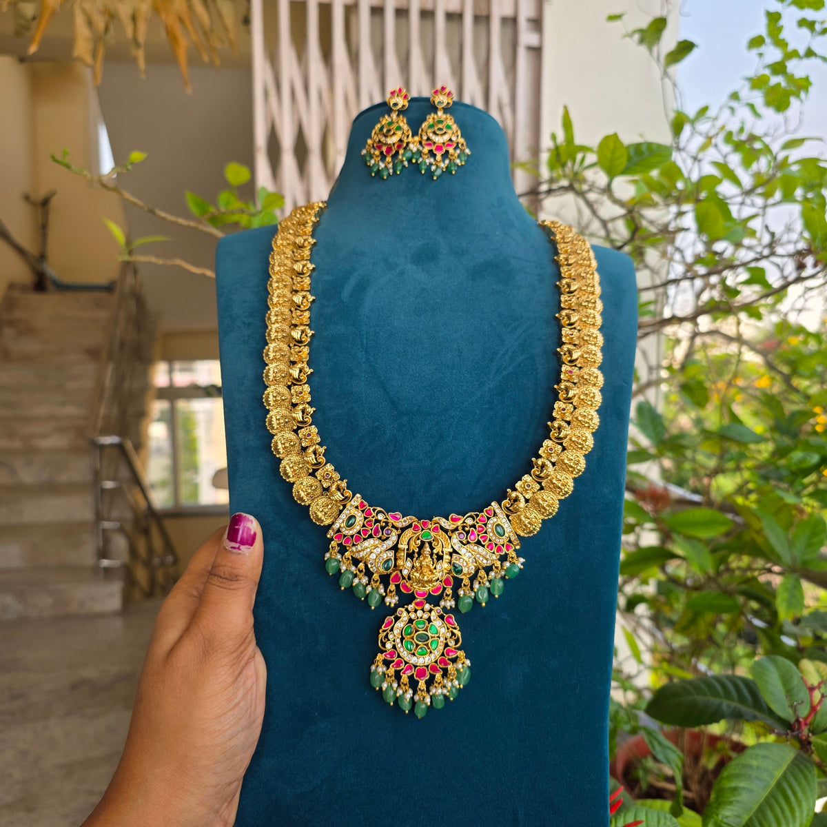 Sonali-  lakshmi and peacock kasu mala with jadau detailing