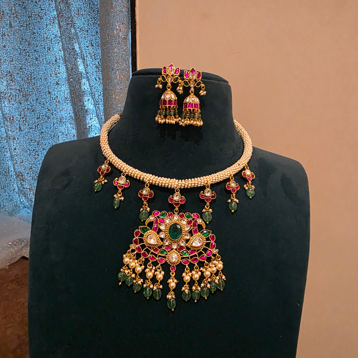 Mandara- pearl hasli with jadau pendant and earrings