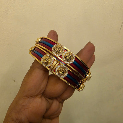 Jaya- antique bangle frame with 12 colors of changeable plastic bangles.