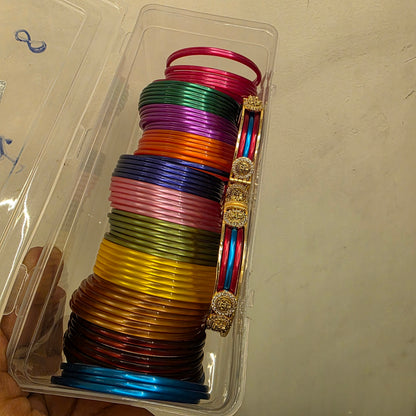 Jaya- antique bangle frame with 12 colors of changeable plastic bangles.