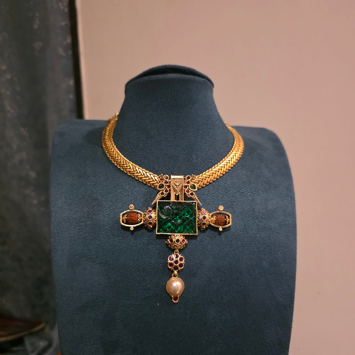 Swacha- carved stone and rudraksh embellished pendant