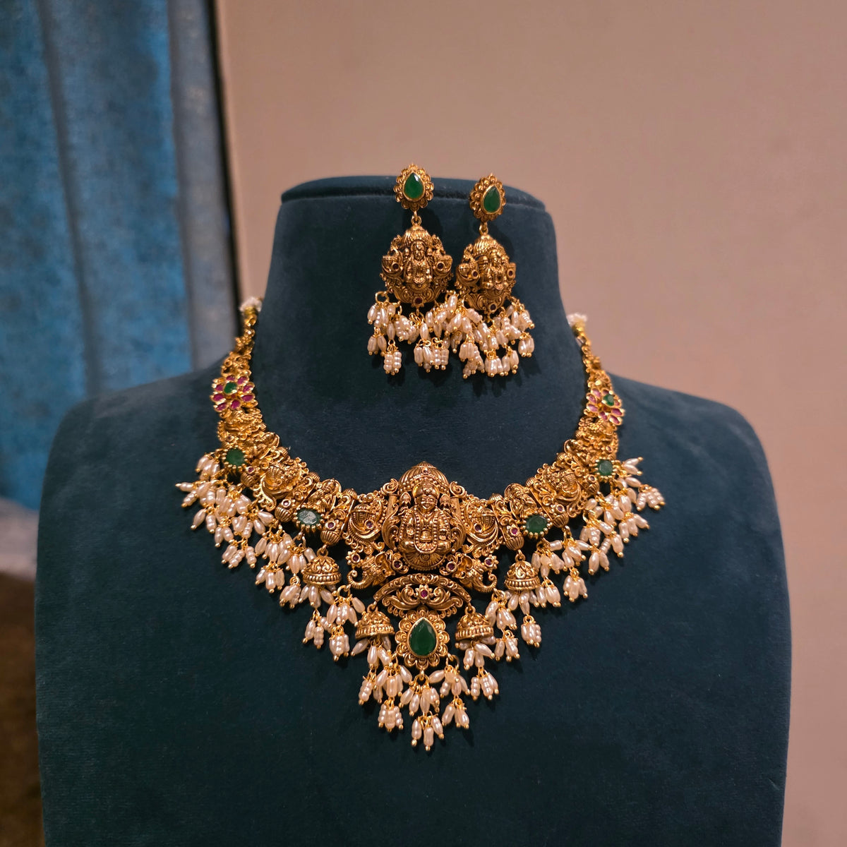 Hassini- antique gold jewellery with rice pearls