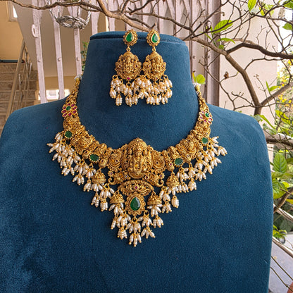 Hassini- antique gold jewellery with rice pearls
