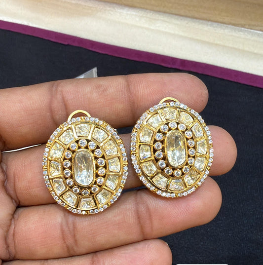 Oval shaped polki studs in white
